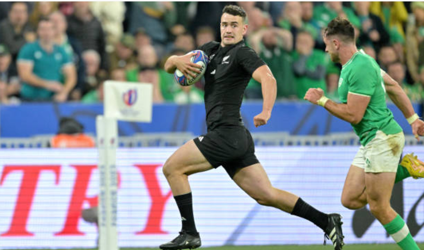 Will Jordan of New Zealand runs with the ball during the Rugby World Cup France 2023 Quarter Final match between Ireland and New Zealand at Stade de France in Paris, France on October 14, 2023 at 10:00 AM. Photo: Lionel Hahn/Getty Images