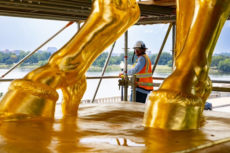 Workers remove scaffolding from the Arts of War statue at the Arlington Memorial Bridge in Washington D.C. on 07/27/2026.