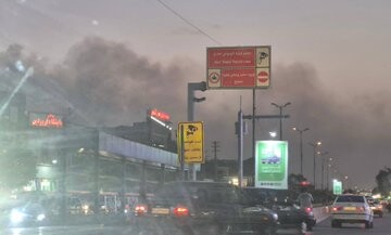 Donald J. Trump posted an image of smoke over a city on Truth Social on 07/08/2026.