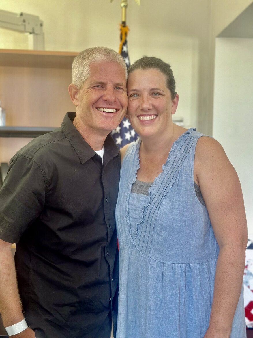 Christian missionary Kevin Rideout embraces his wife at Washington D.C. on 08/21/2026.