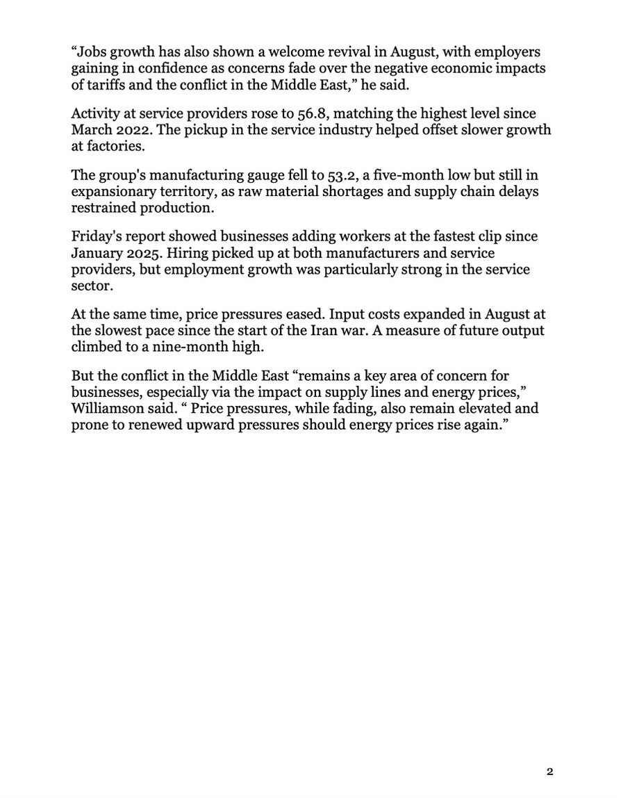 A screenshot of a Bloomberg news report detailing U.S. business activity is displayed at Washington D.C.